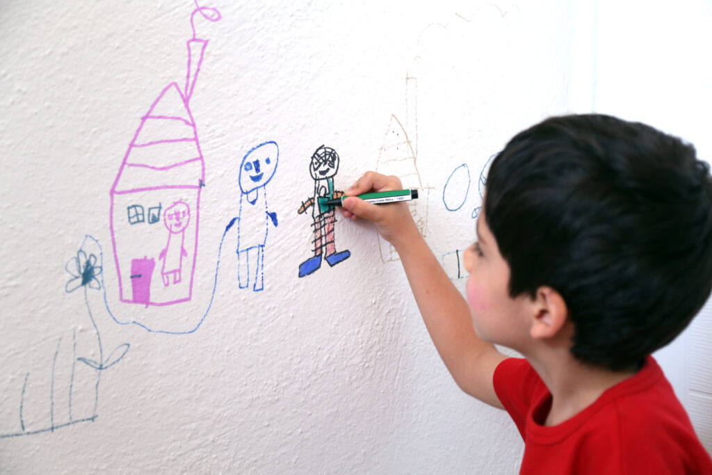 Child drawing wall